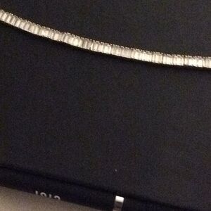 A diamond bracelet set in faux gold and diamonds